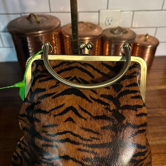 Patricia Nash Tiger Print collection. NWT. Kiss lock. Three straps. Dust bag